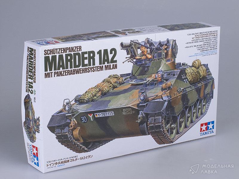 Сборная модель MARDER 1A2 с реактив.установкой Milan. C детализированным двигателем, фигурами командира и водителя. в масштабе 1:35 Tamiya Сборная модель MARDER 1A2 с реактив.установкой Milan. C детализированным двигателем, фигурами командира и водителя. Tamiya